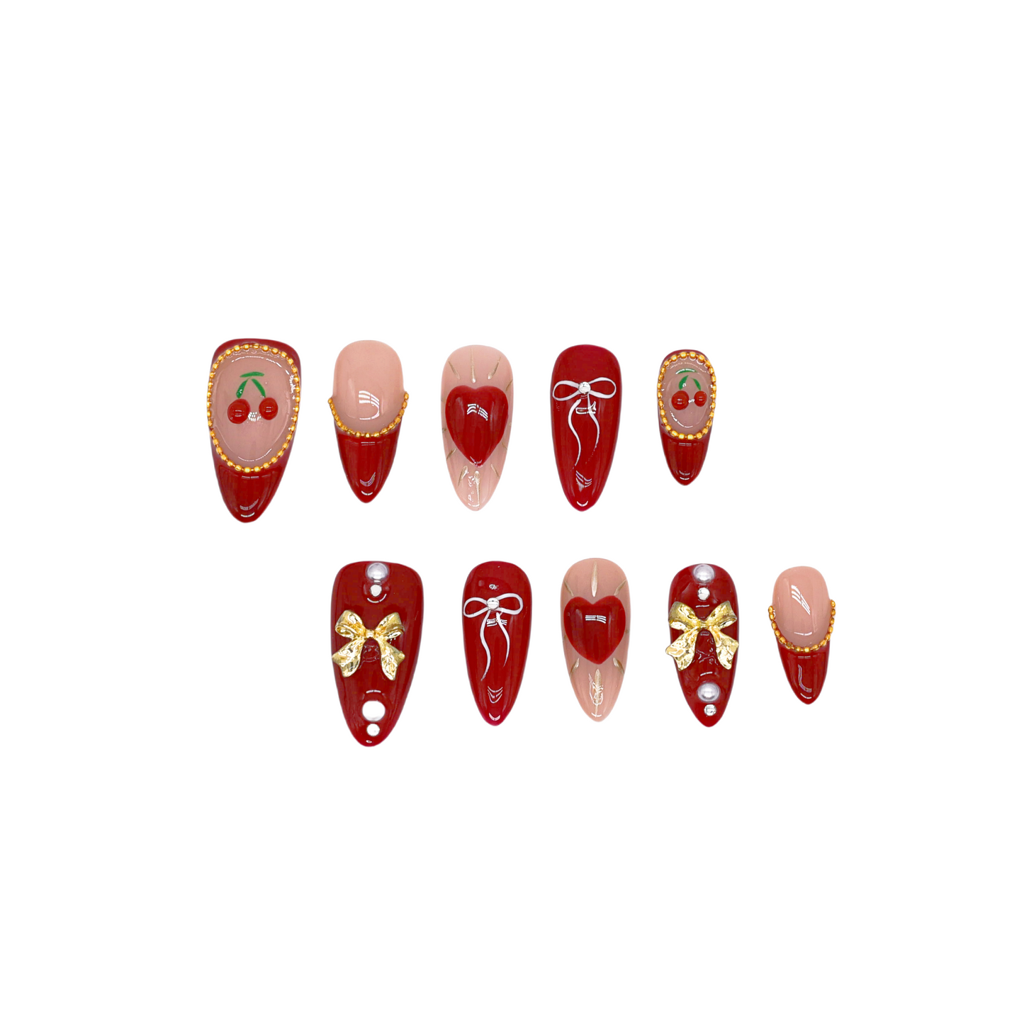 Cherry Kiss & Crimson Bows press-on nails with red and nude tones, 3D cherry and gold bow charms, heart and ribbon accents, almond shape.