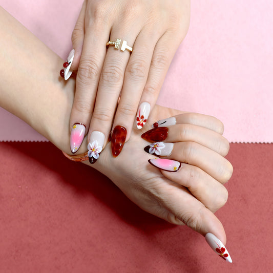 Red and pink ombre press on nails with 3D flowers, gemstone accents, and glossy finish – Heart & Heat Collection.