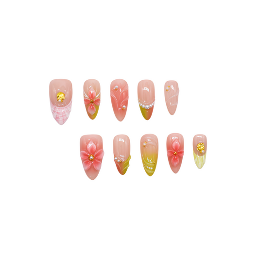 Peach Blossom Whispers press-on nails with soft gradient pink tones, 3D blossoms, pearl accents, and handmade floral designs.