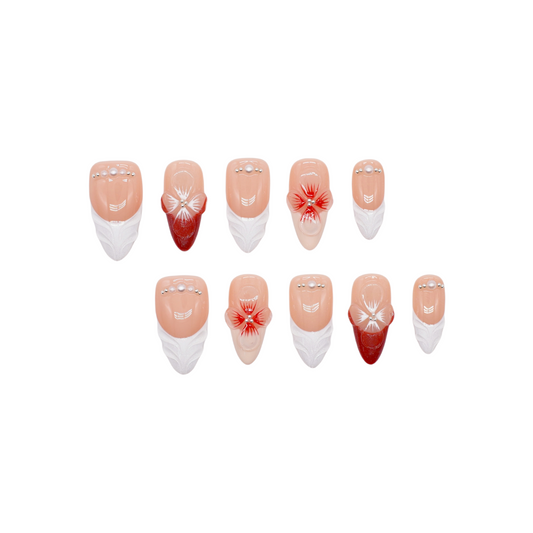 Red and white press on nails with 3D floral accents, leaf-shaped tips, and crystal embellishments – square shape from Heart & Heat Collection.
