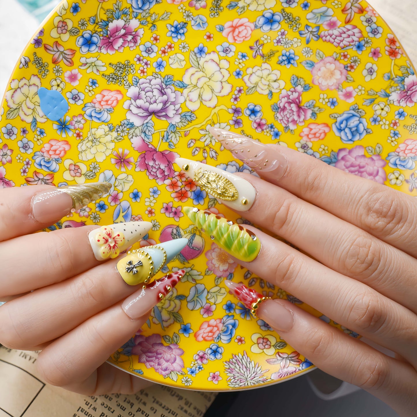 Colorful handmade fruit inspired press on nails featuring citrus slices, blueberry details and dessert inspired artwork.