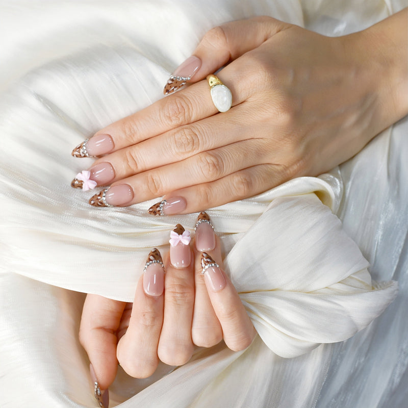 French tips, soft neutrals, and elegant line work — elevated everyday style with subtle florals and a polished finish