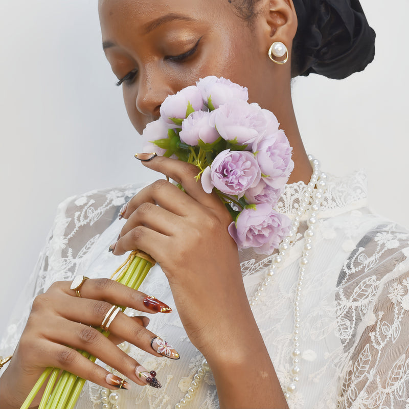 Handmade ombré press-on nails with sunset-inspired shades and tropical gradients