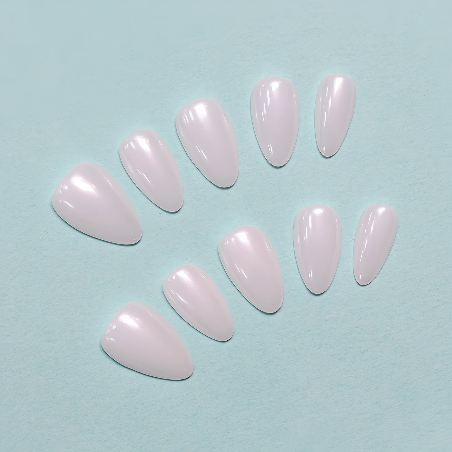 Angel Pearl glossy white press-on nails by You Are Angel in almond shape with pearl shimmer and minimalist finish.