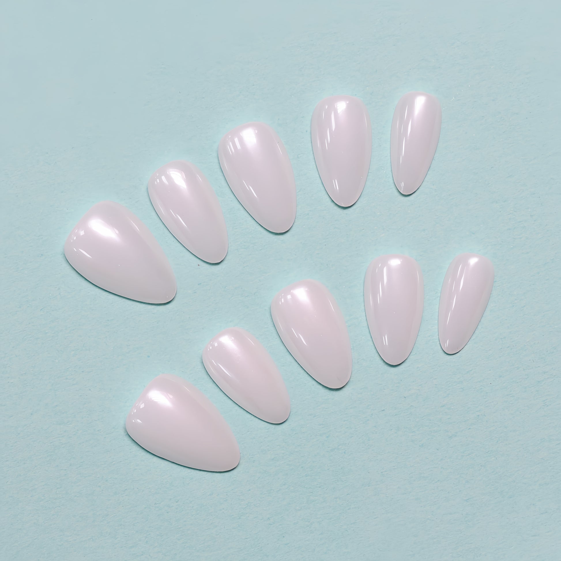 Angel Pearl glossy white press-on nails by You Are Angel in almond shape with pearl shimmer and minimalist finish.