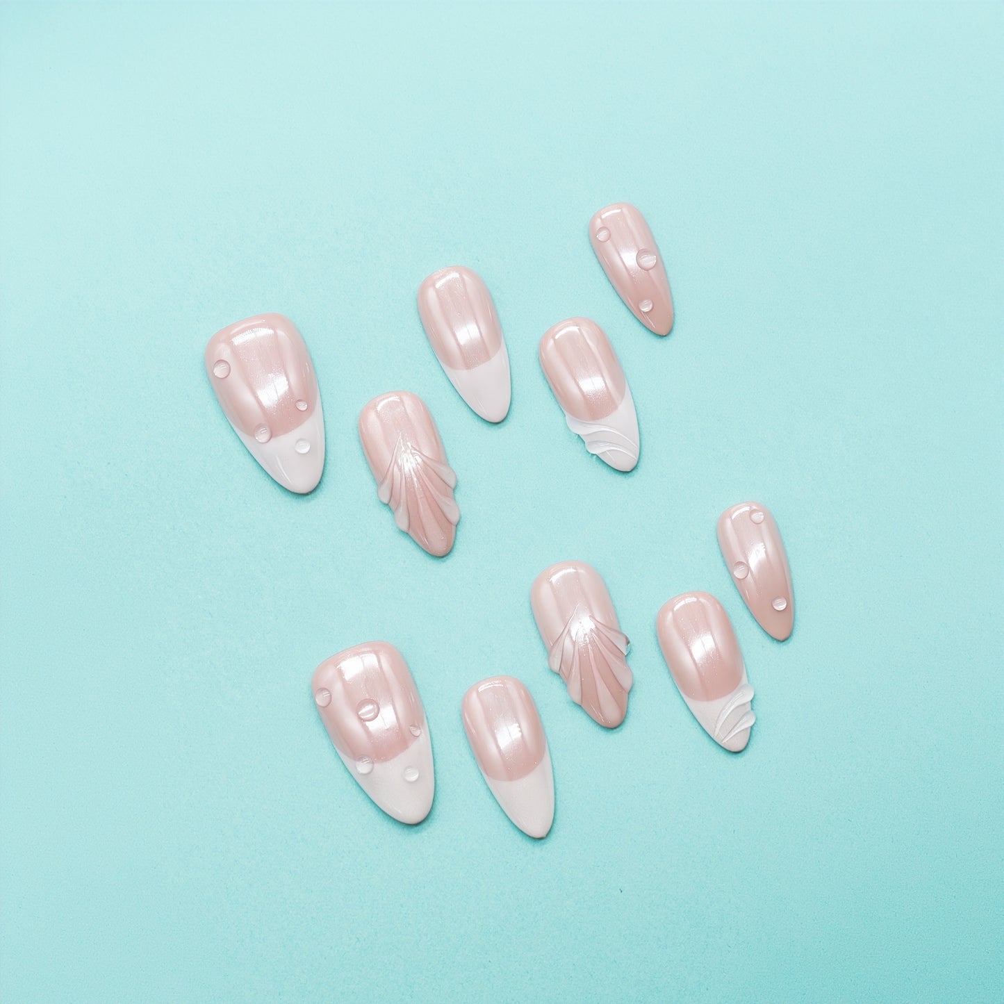 Bare Glow handmade press-on nails by You Are Angel featuring nude peach base, clear diagonal tips, and subtle gem accents in almond shape.