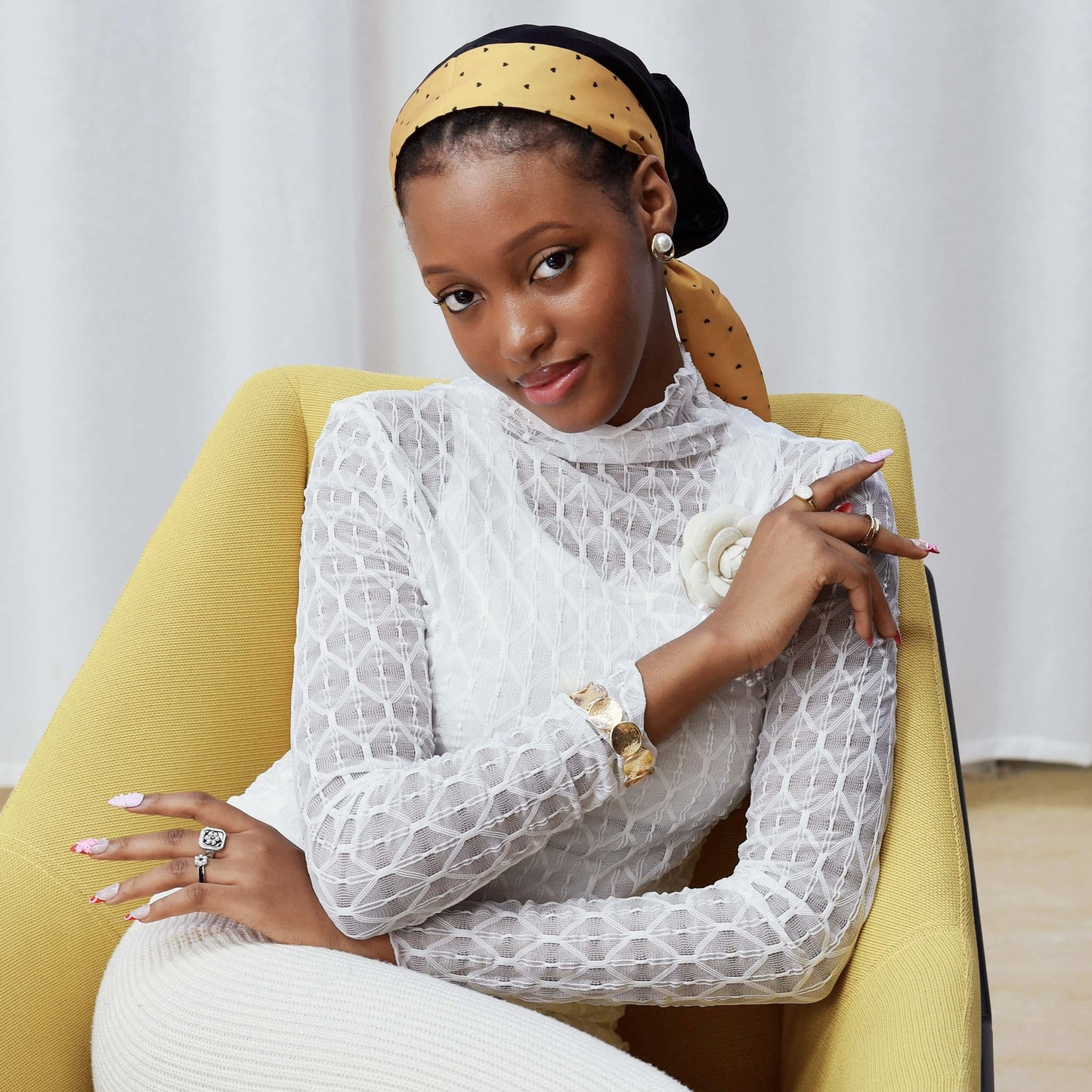 Blooming Amour 3D floral press-on nails featuring red French tips, pink flower accents, and glossy nude base.