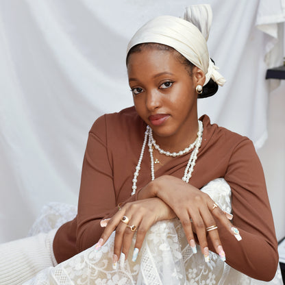 Blooming Sky Dreams press-on nails with pastel blue and pink floral accents.