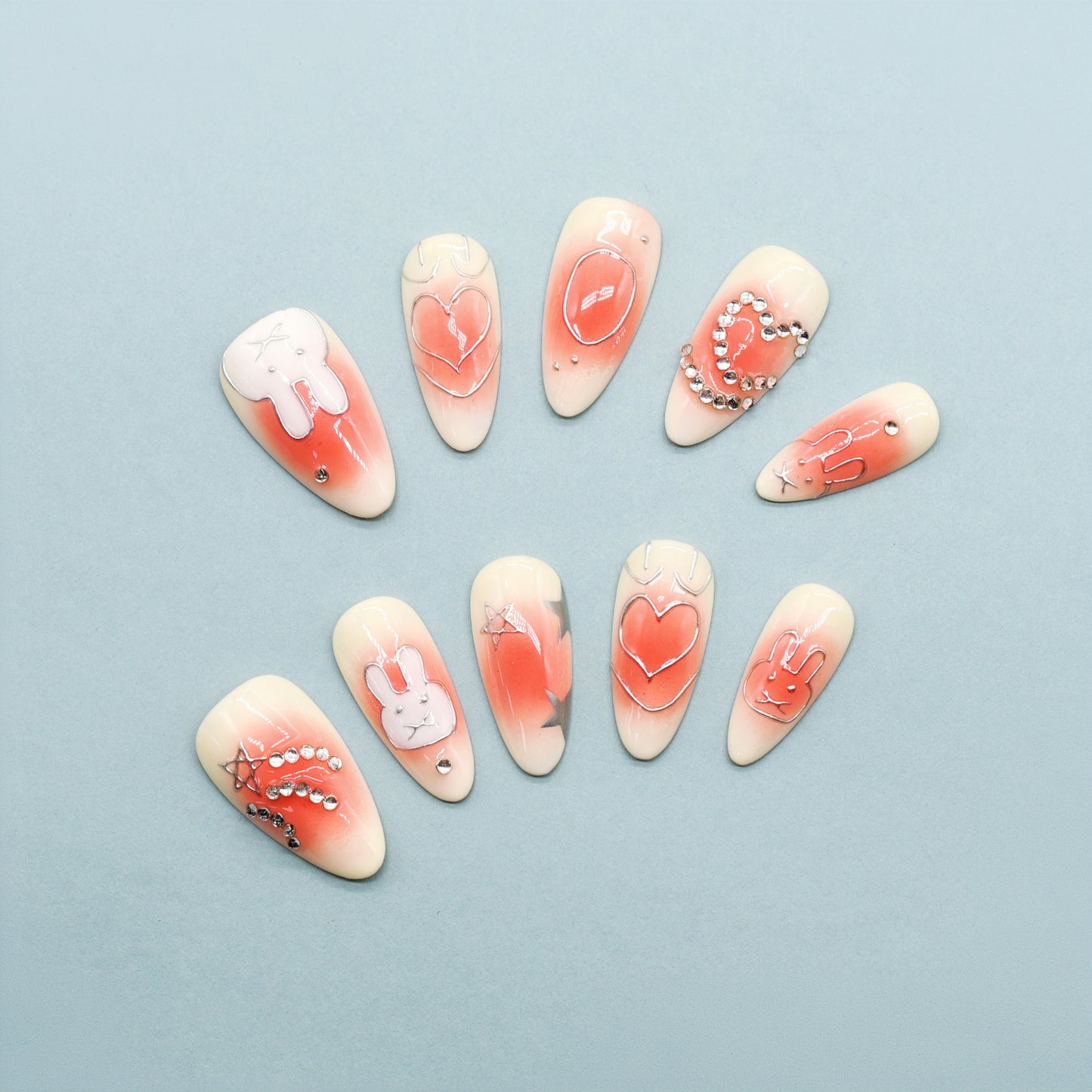 Nail art designs on a light blue background