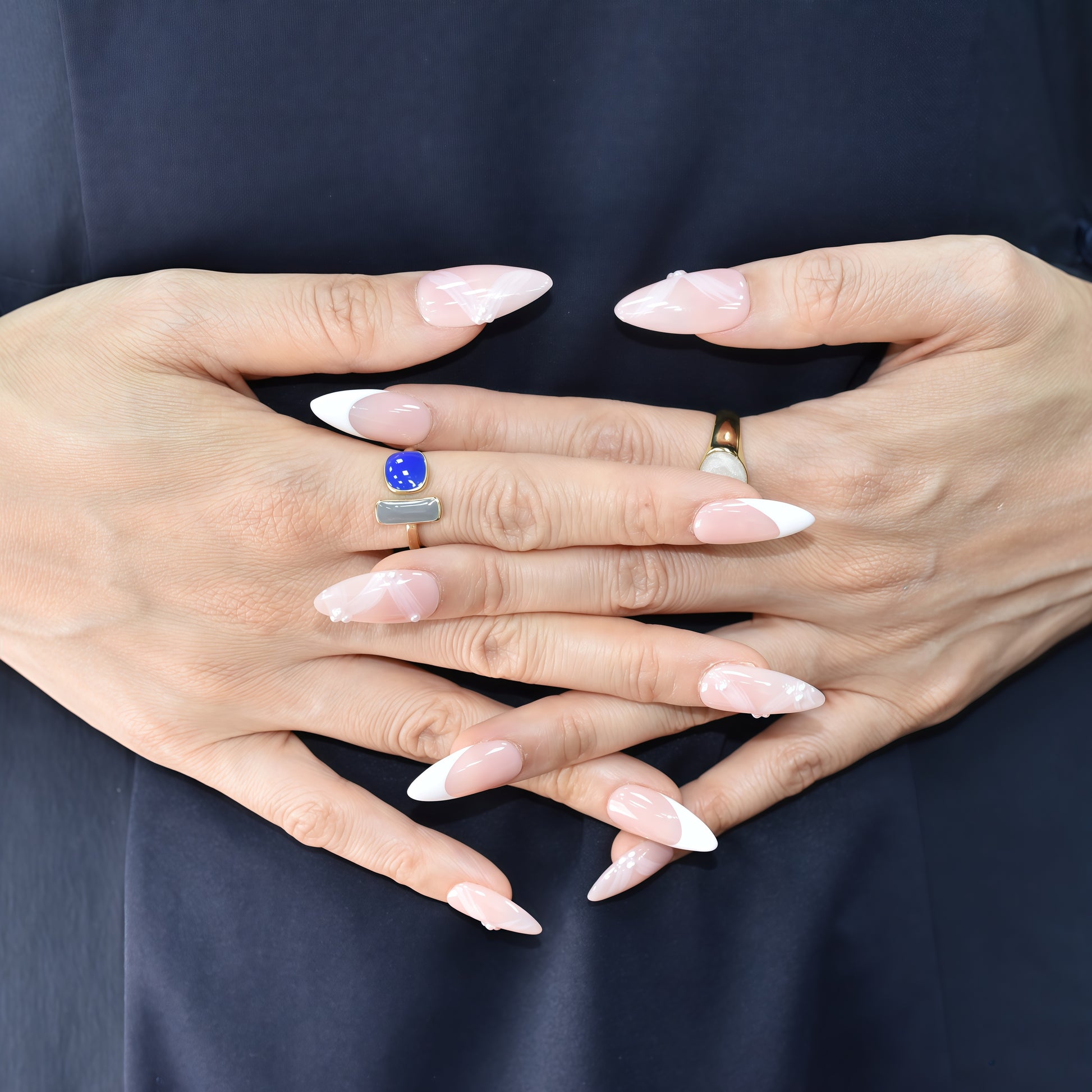 Crystal Dew almond press-on nails with soft pink base, clear tips, and 3D droplet accents.