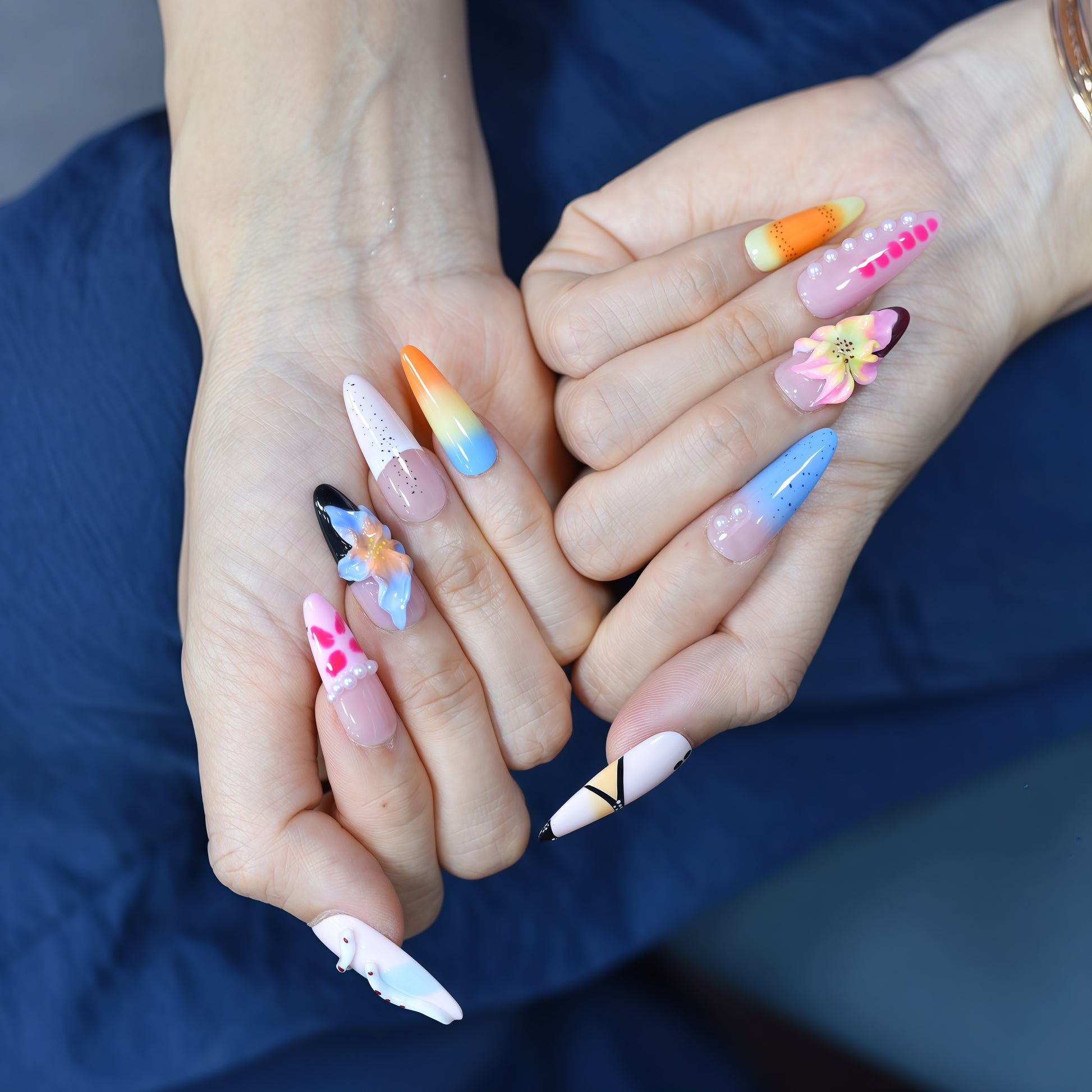 Dream Pop press-on nails by You Are Angel featuring 3D flowers, pink and blue ombré, pearl dots, and fun summer colors.