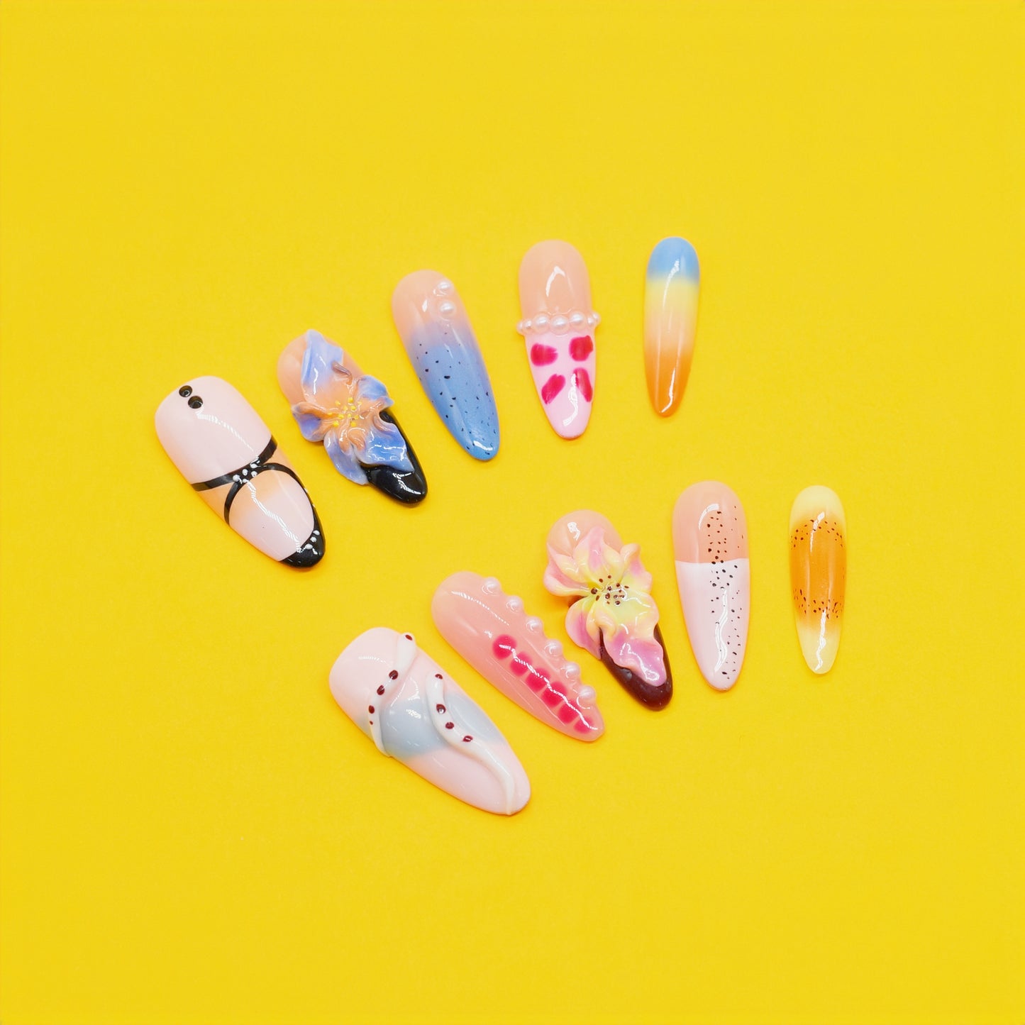 Dream Pop press-on nails by You Are Angel featuring 3D flowers, pink and blue ombré, pearl dots, and fun summer colors.