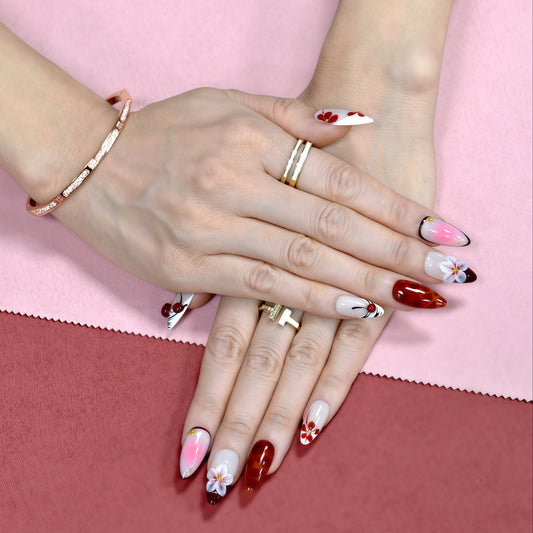 Red and pink ombre press on nails with 3D flowers, gemstone accents, and glossy finish – Heart & Heat Collection.