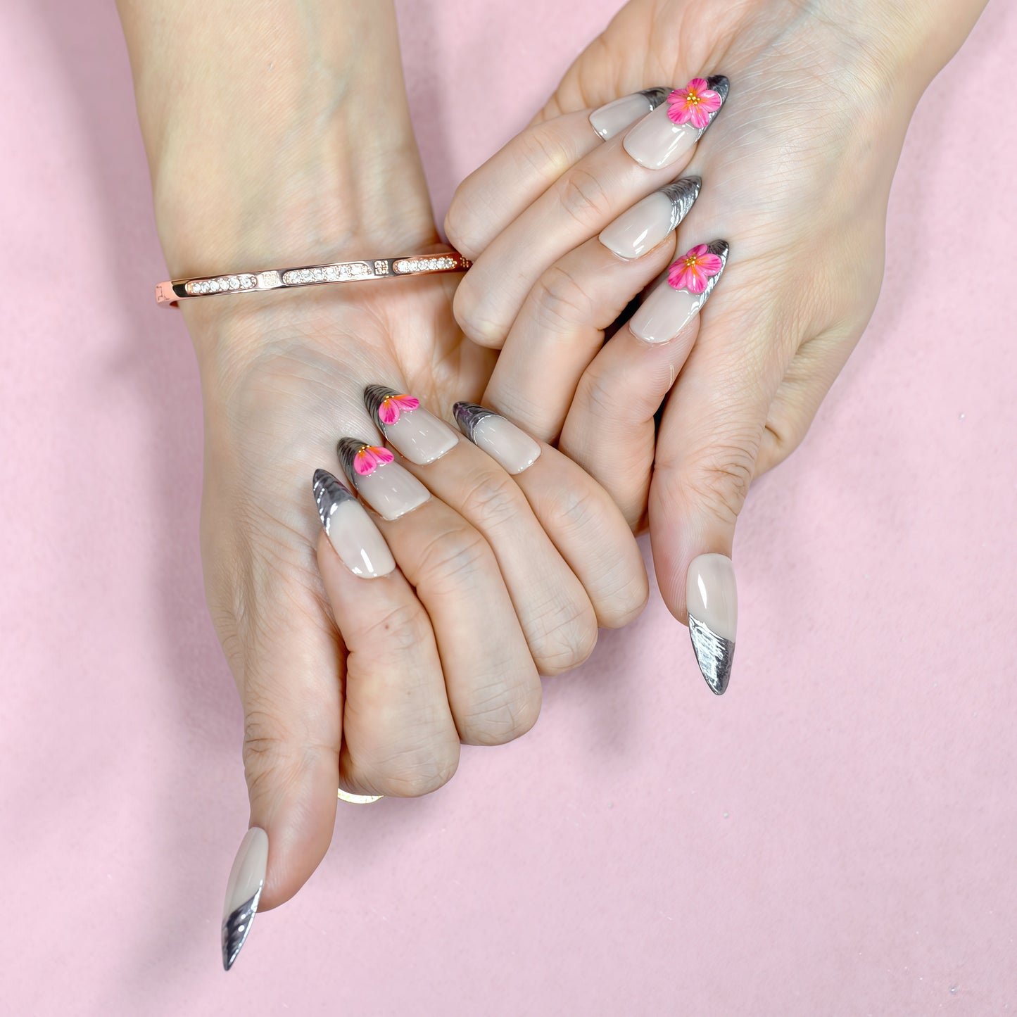 Silver chrome French tip press-on nails with 3D pink flowers – luxury handmade nail set.