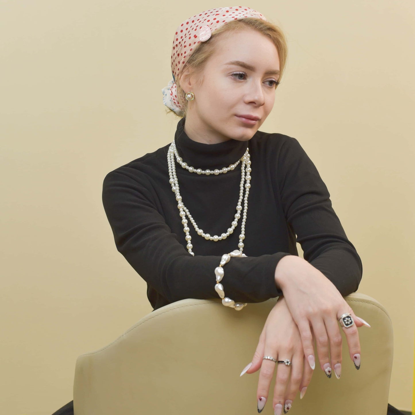 Midnight Lace press-on nails with nude base, black lace tips, red accents, and delicate 3D bows for a romantic elegant look.