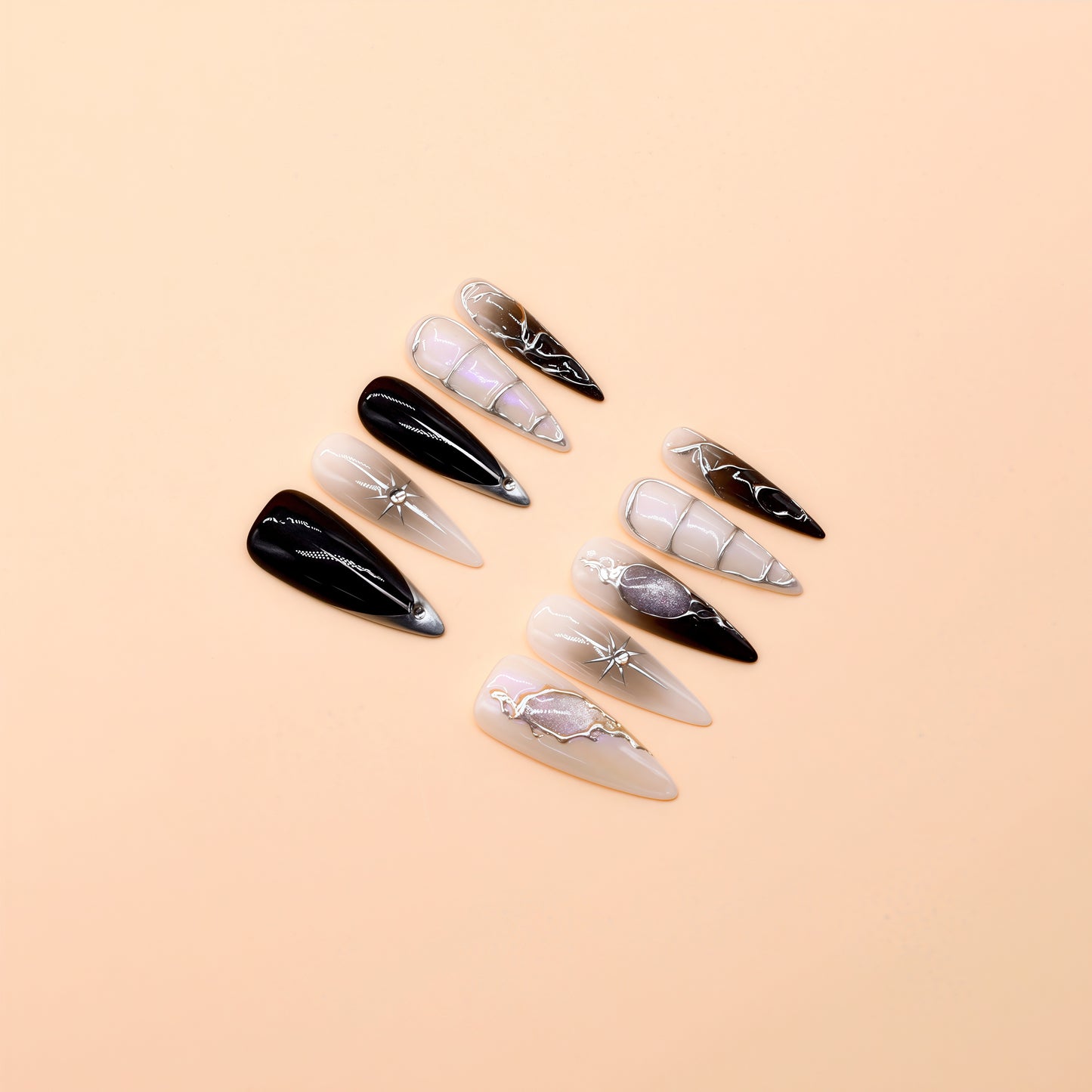 Handcrafted long almond press-on nails with black-to-grey gradient, silver chrome details, and minimalist celestial line art – Obsidian Whisper nail set.