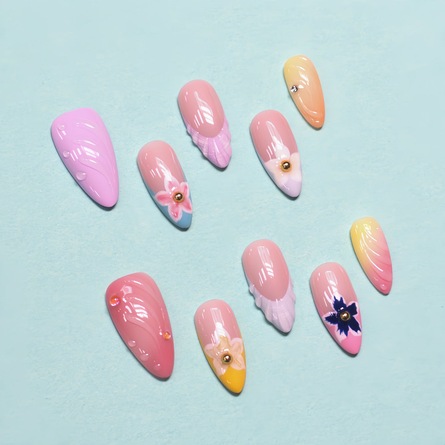 Paradise Petals handmade press-on nails with tropical gradient colors and 3D floral designs, medium almond shape.