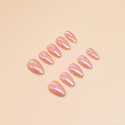 Peach Glaze nude press-on nails by You Are Angel with almond shape and high-gloss finish – soft peach-pink neutral shade.
