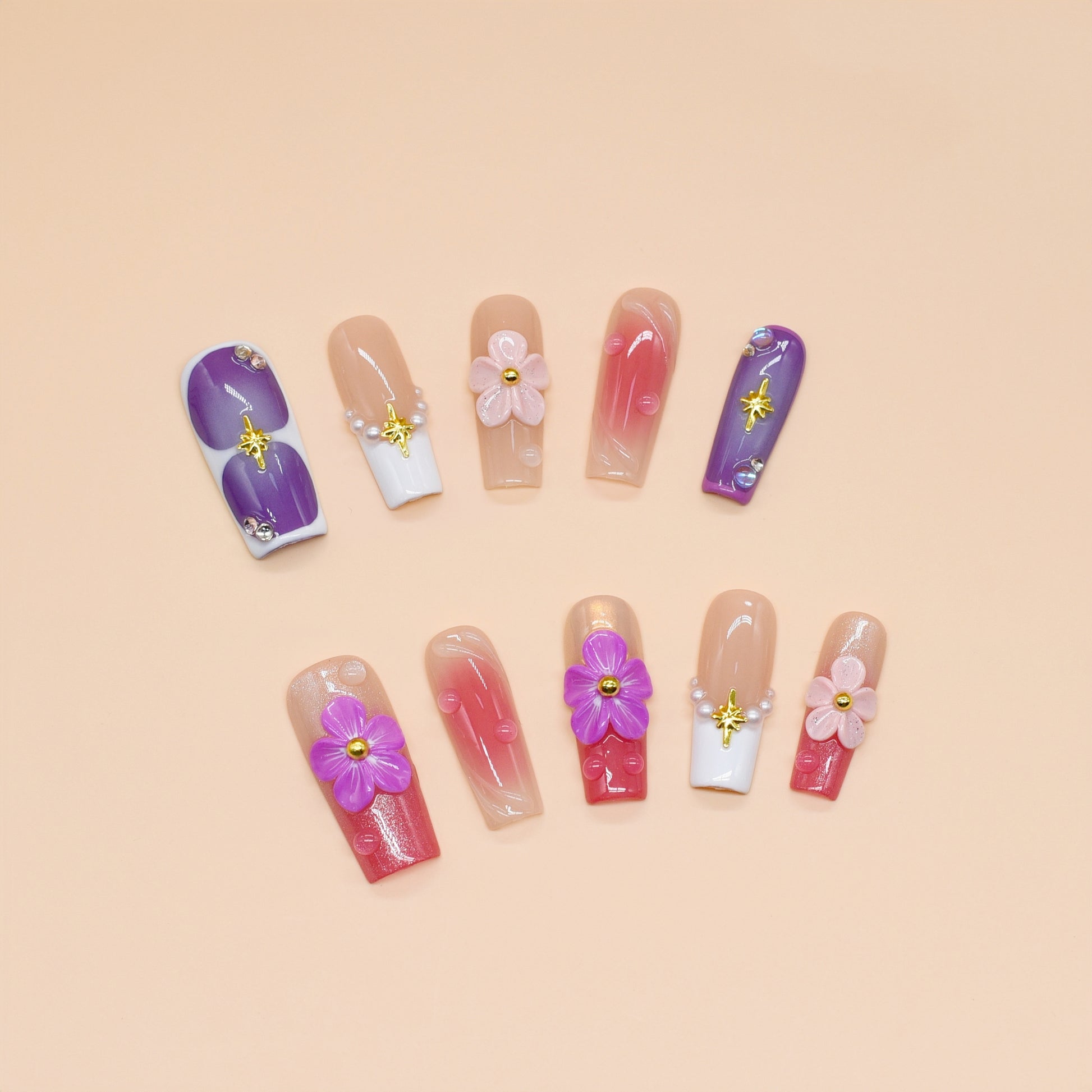 Set of nail art designs with flowers on a beige background