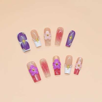 Set of nail art designs with flowers on a beige background