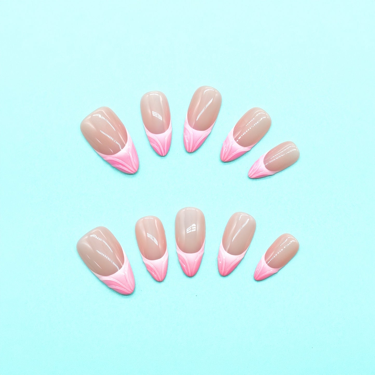 Pink Whisper press-on nails with nude base and pink V-shaped French tips in a glossy soft square finish – handmade by You Are Angel.