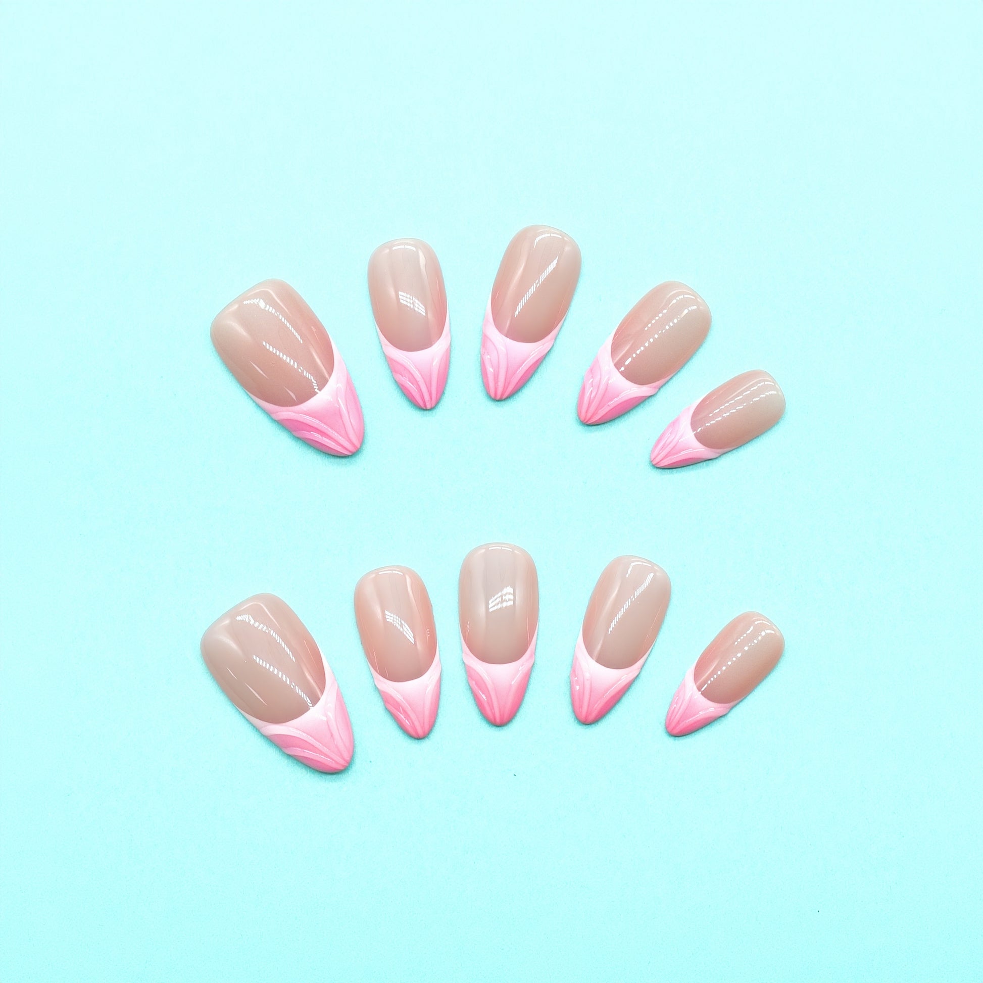 Pink Whisper press-on nails with nude base and pink V-shaped French tips in a glossy soft square finish – handmade by You Are Angel.