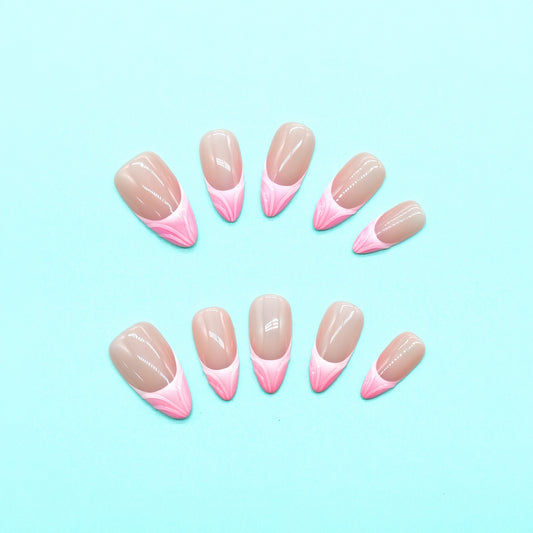 Pink Whisper press-on nails with nude base and pink V-shaped French tips in a glossy soft square finish – handmade by You Are Angel.
