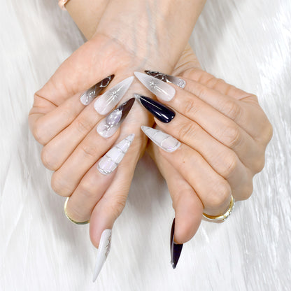 Handcrafted long almond press-on nails with black-to-grey gradient, silver chrome details, and minimalist celestial line art – Obsidian Whisper nail set.