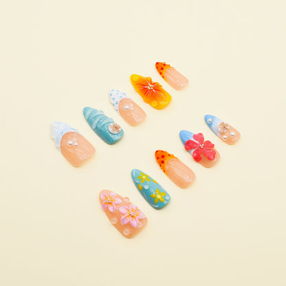 Tropical Bloom & Beach Vibes press-on nails with 3D floral and seashell accents, beach ombré colors in almond shape.