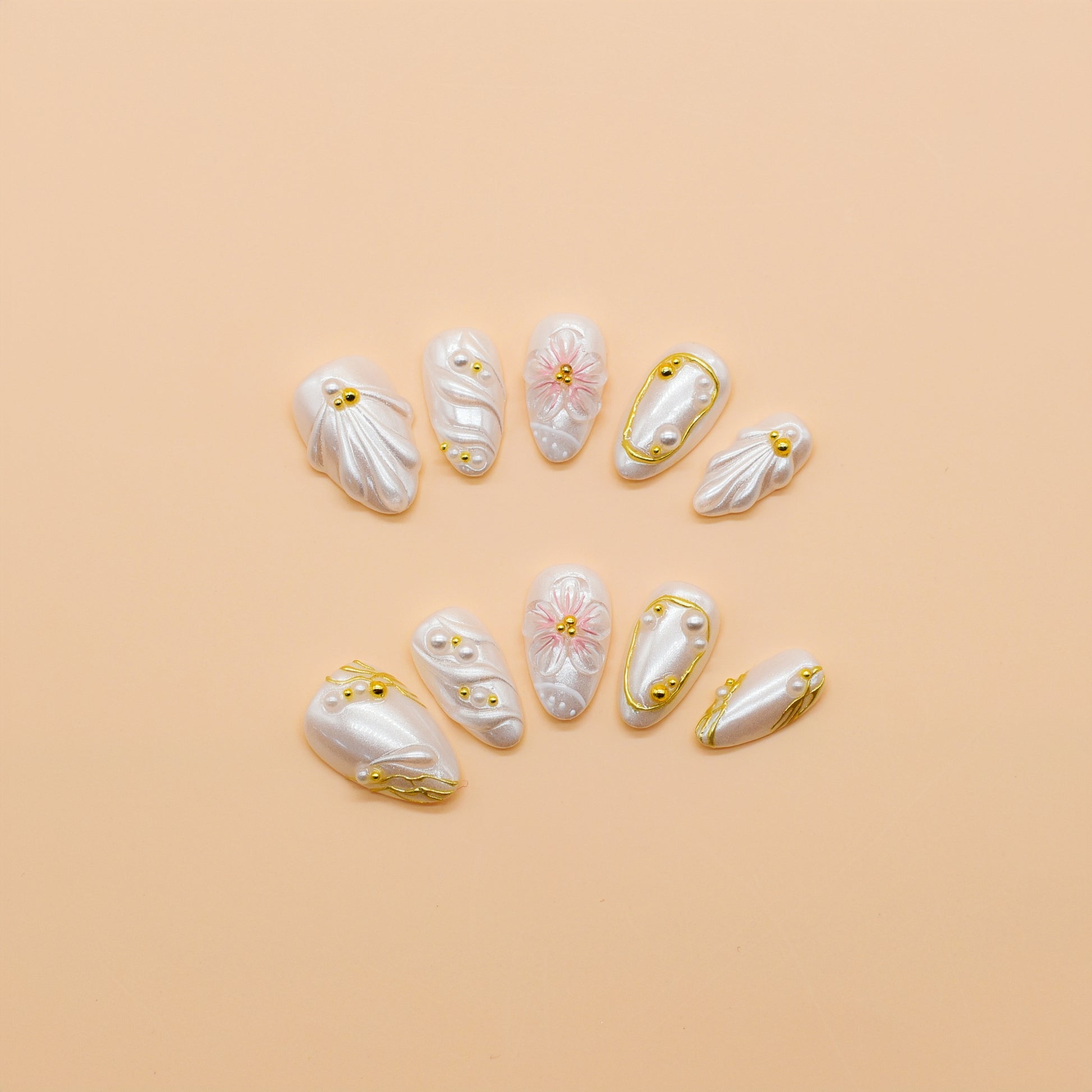 
Almond-shaped coral and fuchsia press-on nails with tropical floral designs, 3D flowers, and ocean-inspired accents – Tropical Sunset Bloom set.