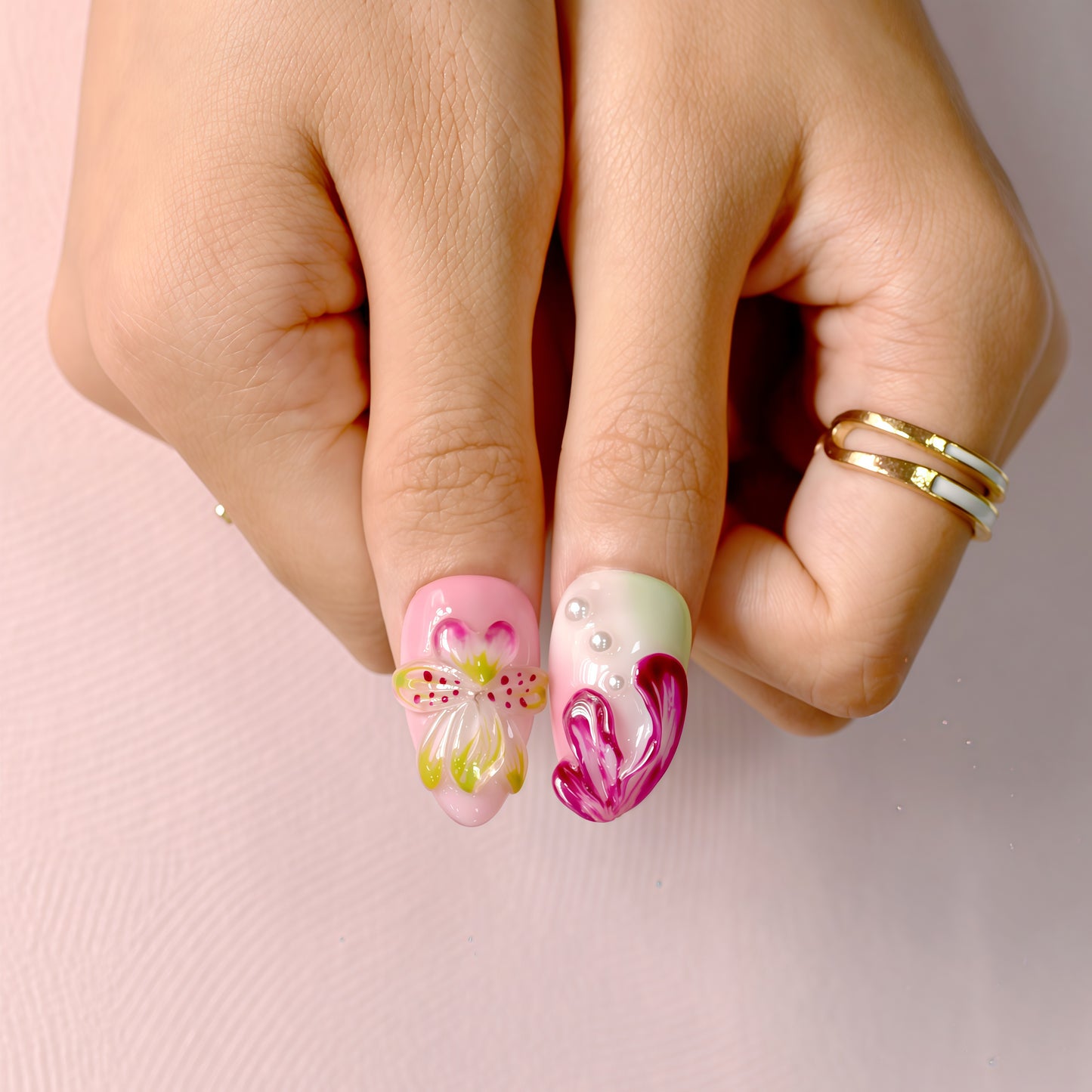 Tutti Frutti Bloom press-on nails featuring a colorful mix of pink, green, and purple with 3D flowers, jelly gradients, and pearl accents in almond shape.