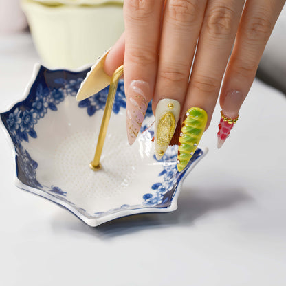 Colorful handmade fruit inspired press on nails featuring citrus slices, blueberry details and dessert inspired artwork.