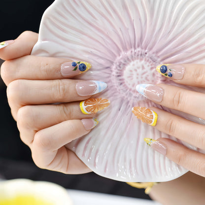 Summer fruit themed press on nails featuring lemons, blueberries and gingham nail art.