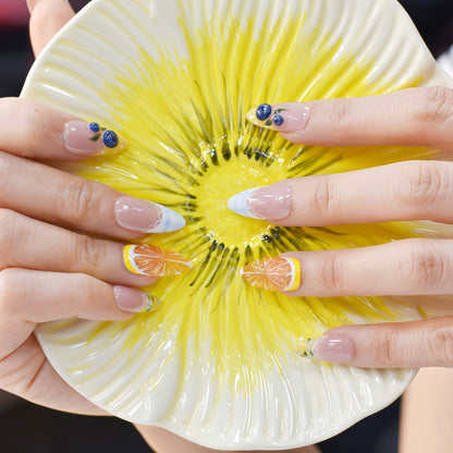 Summer fruit themed press on nails featuring lemons, blueberries and gingham nail art.