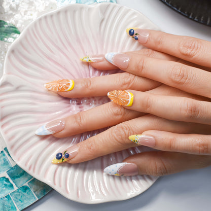 Summer fruit themed press on nails featuring lemons, blueberries and gingham nail art.
