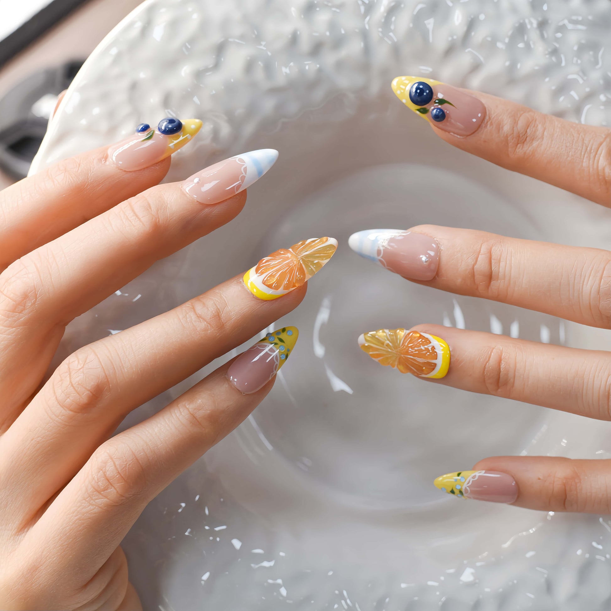 Summer fruit themed press on nails featuring lemons, blueberries and gingham nail art.