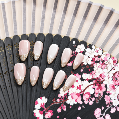 Silver Silk French sheer nude press-on nails with finely layered metallic silver tips — styled product photograph.